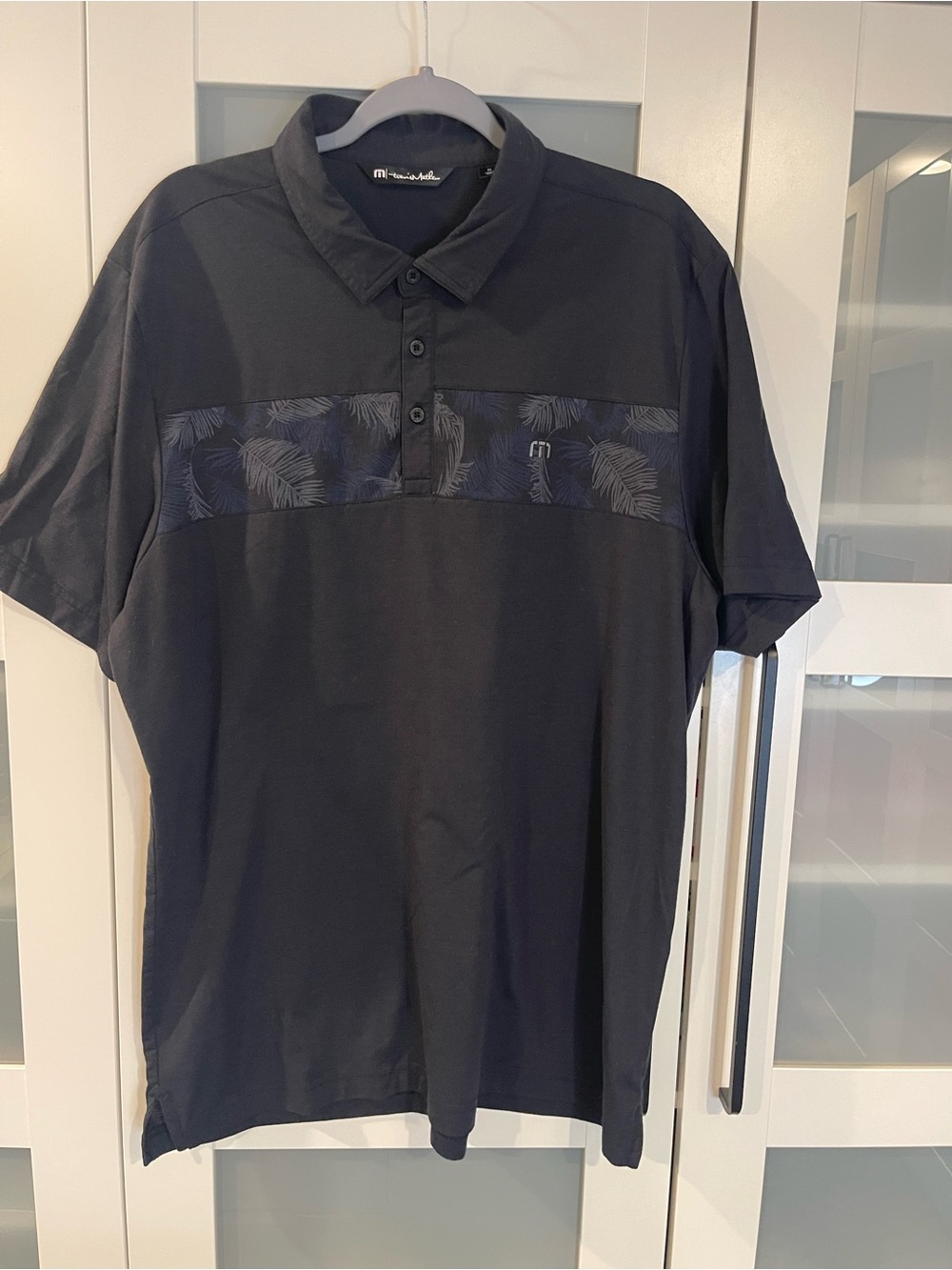 Travis Mathew Black Polo with Tonal Leaf Stripe